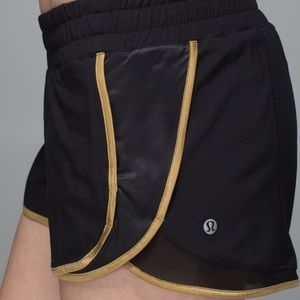 Lululemon super squad short (black/gold, size 8)
